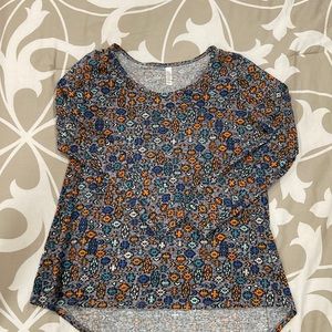 LuLaRoe XL women’s long-sleeved shirt. Grey background with Aztec orange/blue.